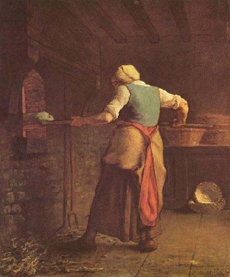 Người phụ nữ nướng bánh mì